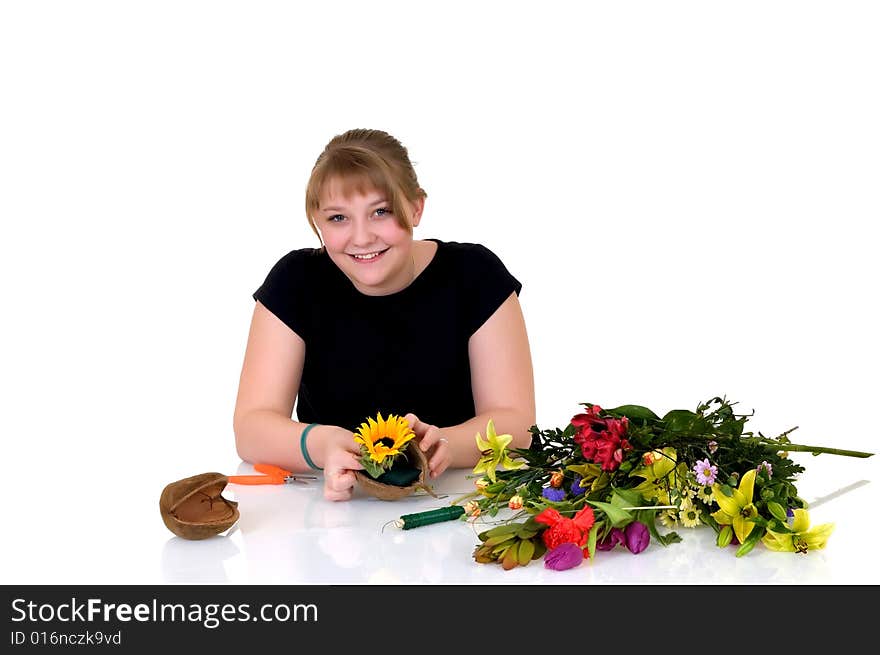 Young girl arranging flowers