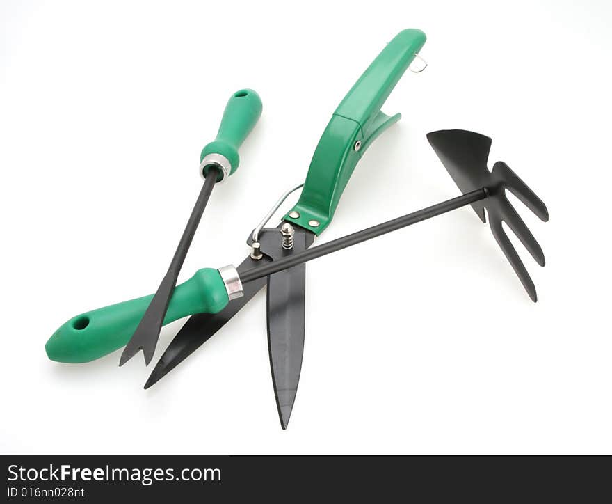 Cultivator, weeder and trimmer for maintaining lawn. Cultivator, weeder and trimmer for maintaining lawn