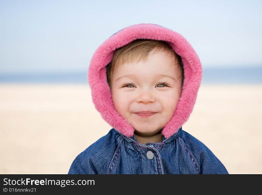 Portrait of sweet and happy baby girl outdoor