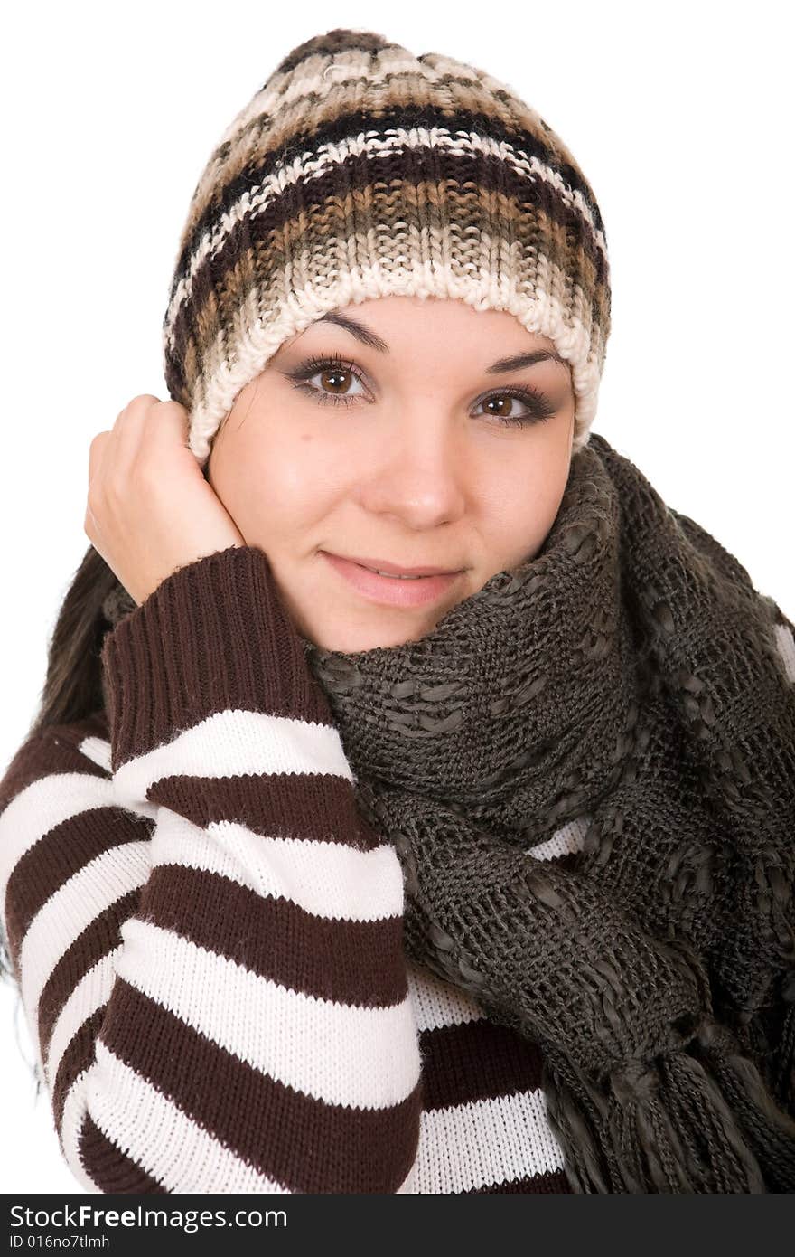 Attractive brunette winter woman. Over white background