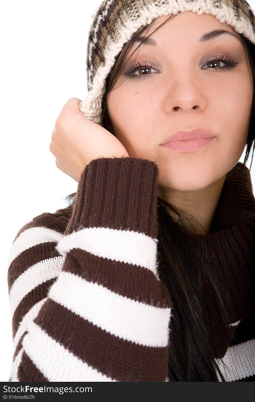 Attractive brunette winter woman. Over white background