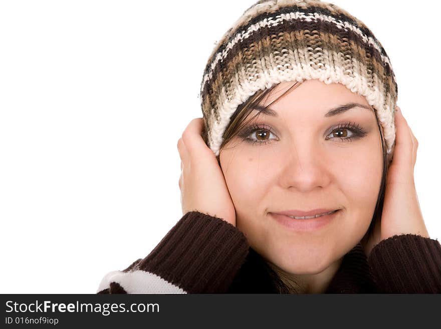 Attractive brunette winter woman. Over white background