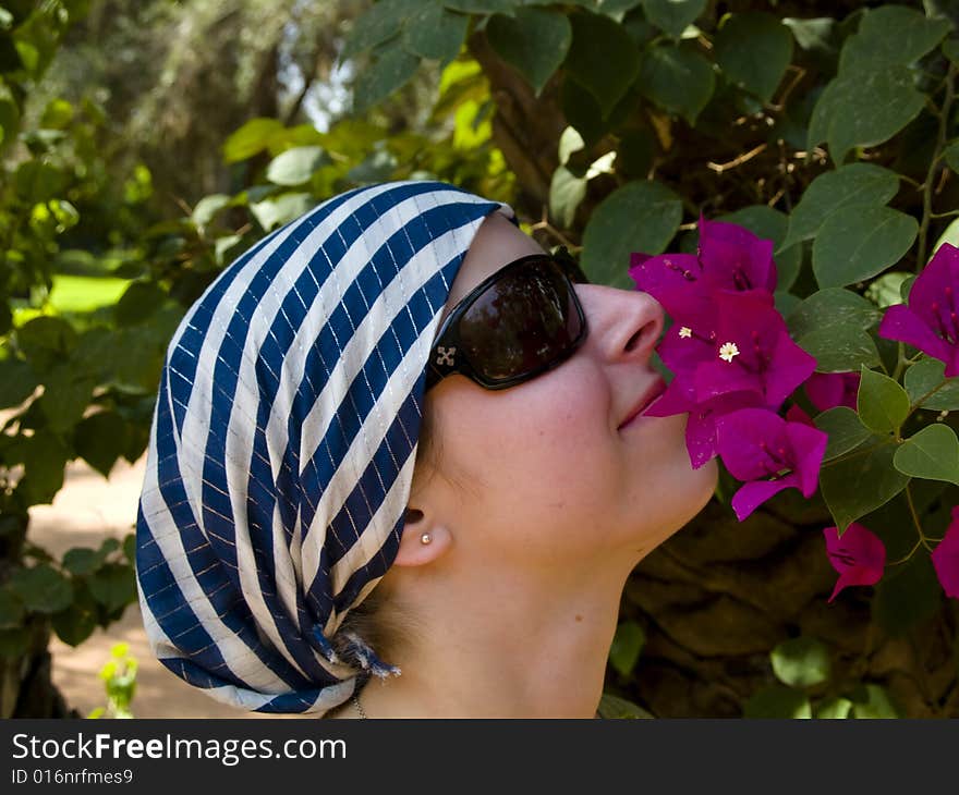 Violet flowers on the tree and beauty young women. Violet flowers on the tree and beauty young women.