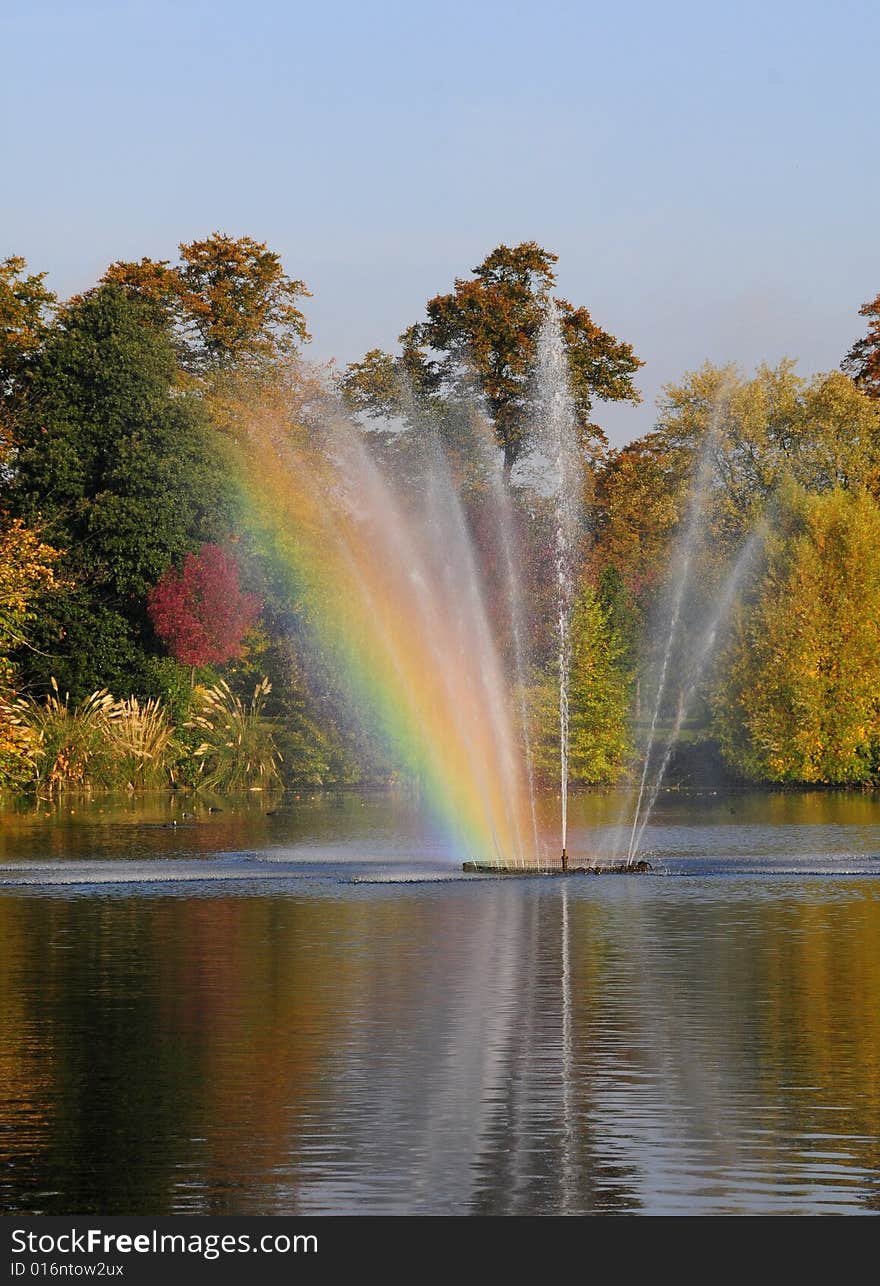 Beautiful fountain and lake in autumn