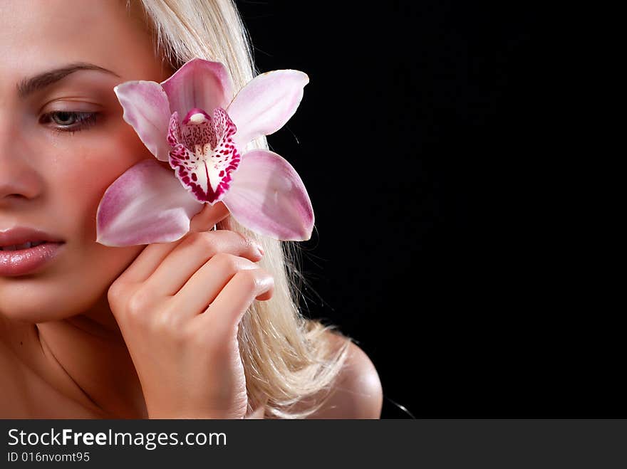 Face Of Woman And Orchid