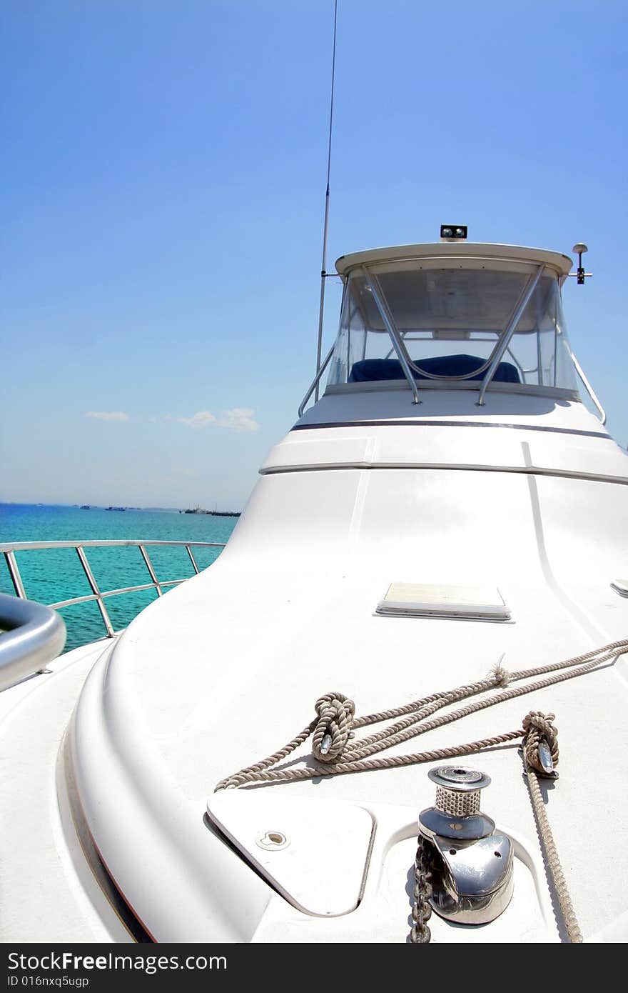 Yacht moored at tropical ocean