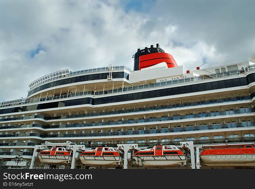 Big cruise ship docked in a port. Big cruise ship docked in a port.