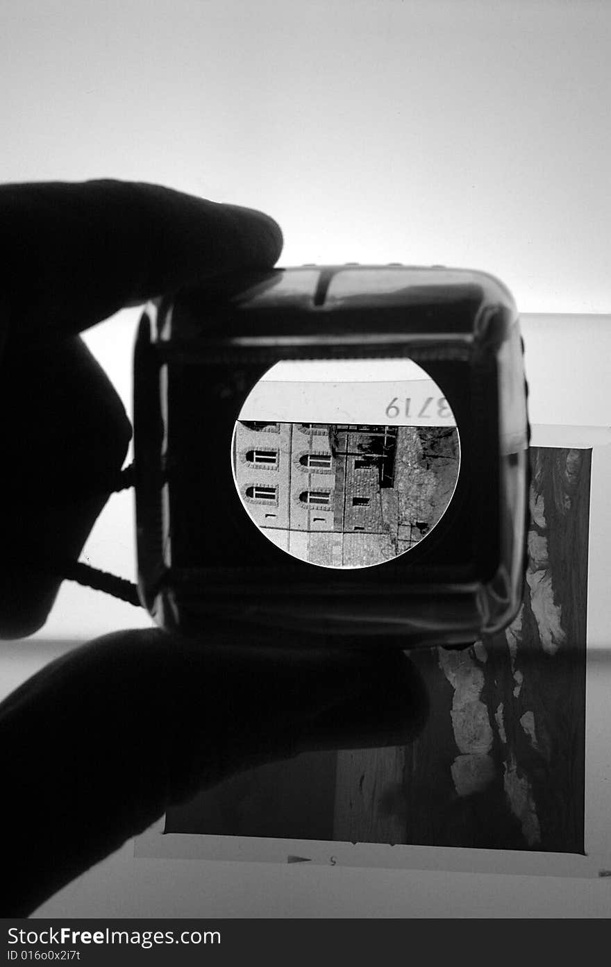 See black and white film with a lens. See black and white film with a lens