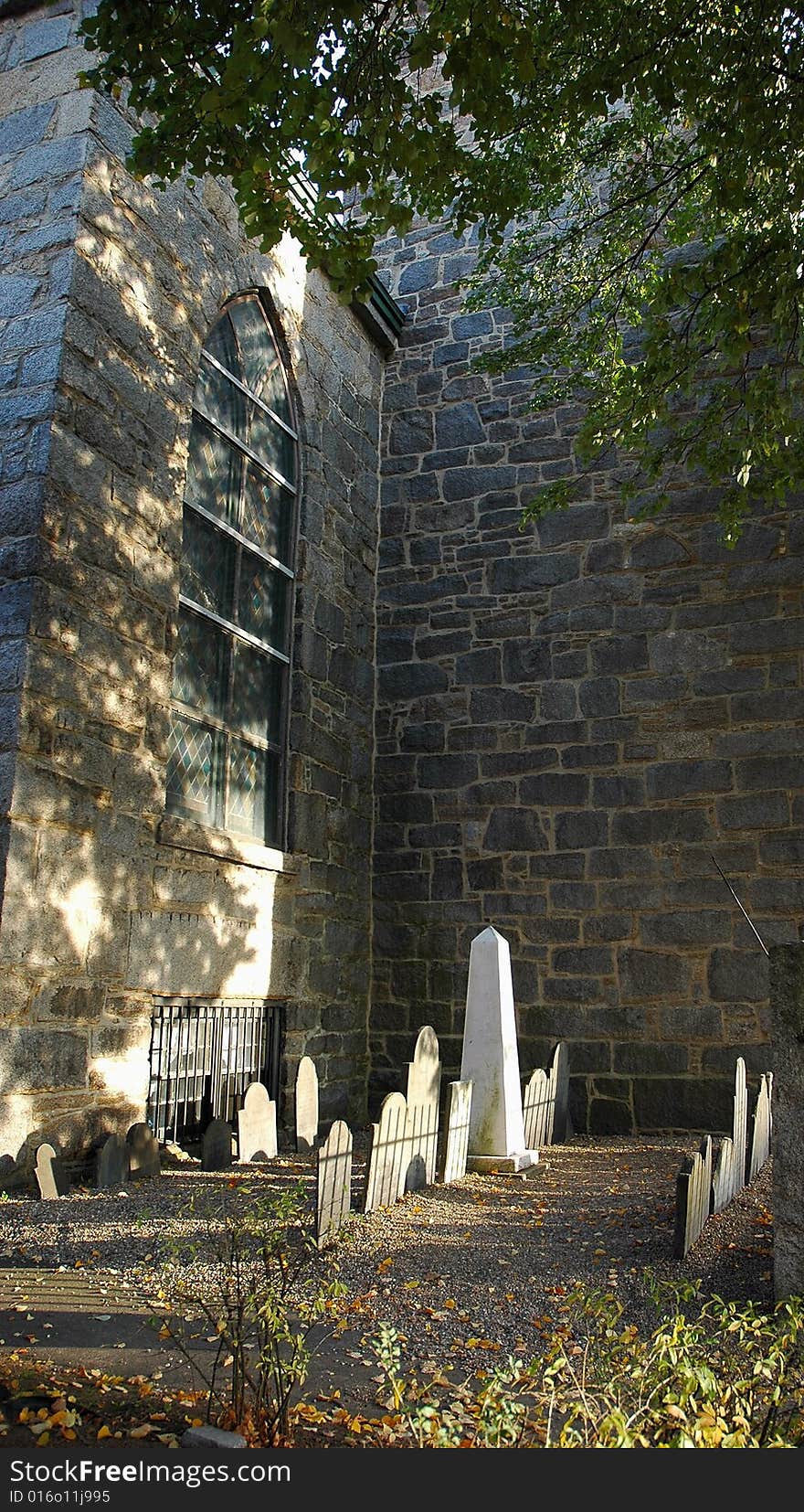 Small mysterious graveyard at the small church