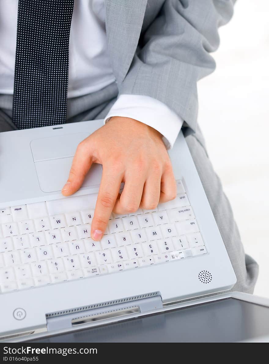 Close up of middle aged business man is working on laptop. Close up of middle aged business man is working on laptop