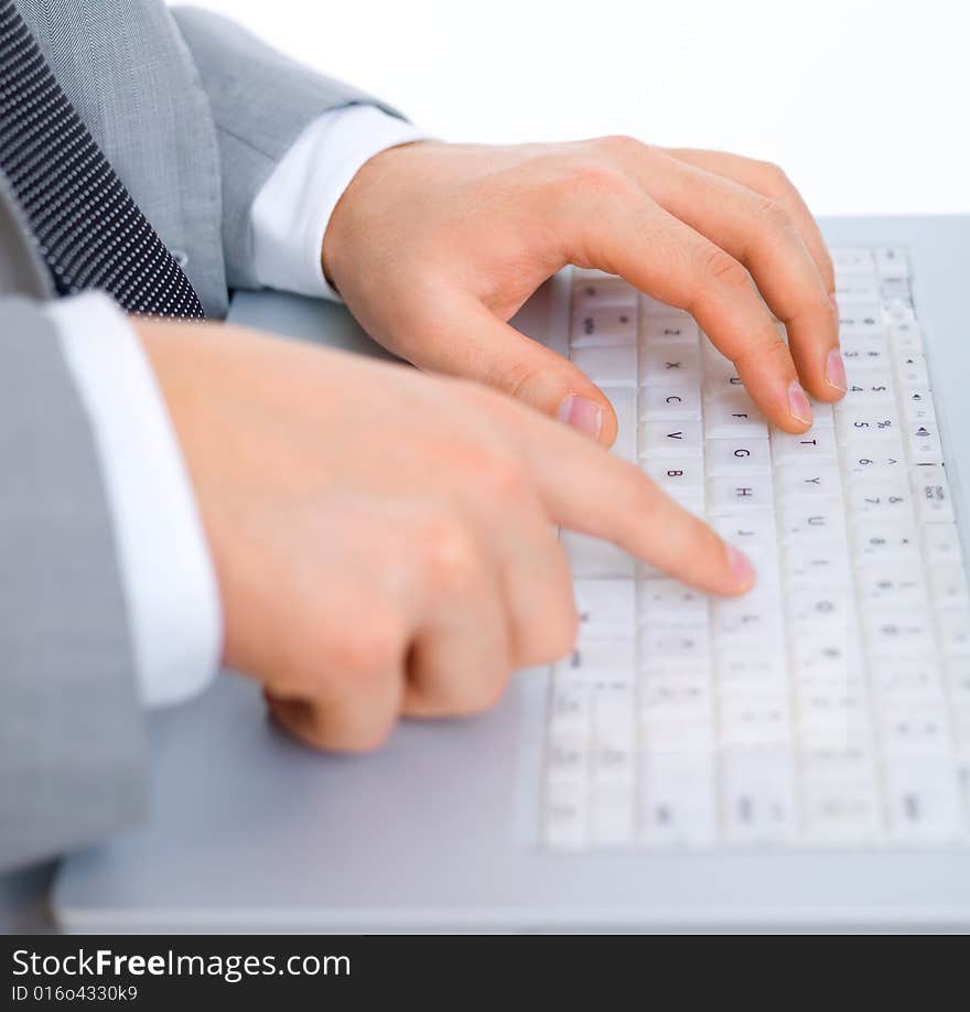 Close up of middle aged business man is working on laptop. Close up of middle aged business man is working on laptop