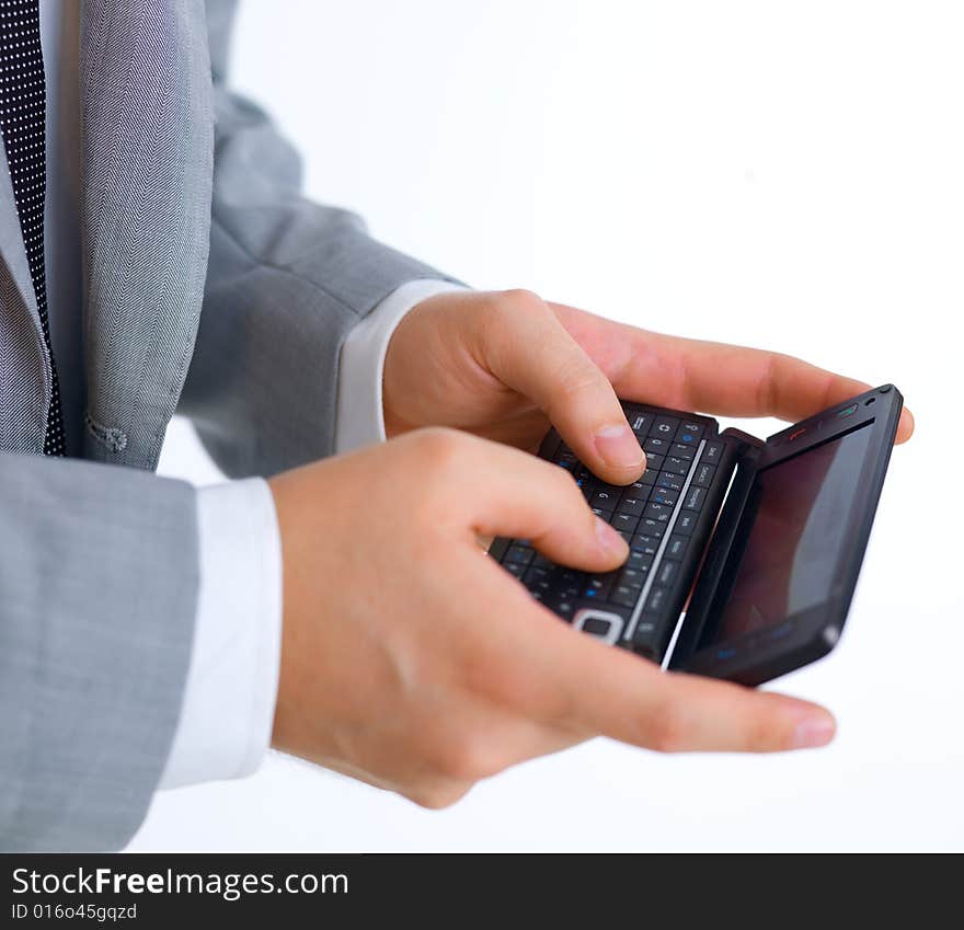 Close up of middle aged business man using cell phone. Close up of middle aged business man using cell phone