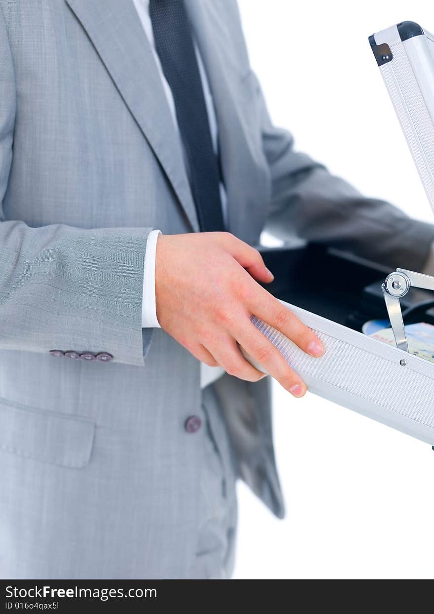 Close up of middle aged business man holding suitcase. Close up of middle aged business man holding suitcase