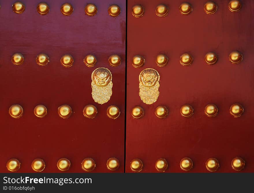 Decorated door of ancient chinese building, door with dragon decorations. Decorated door of ancient chinese building, door with dragon decorations