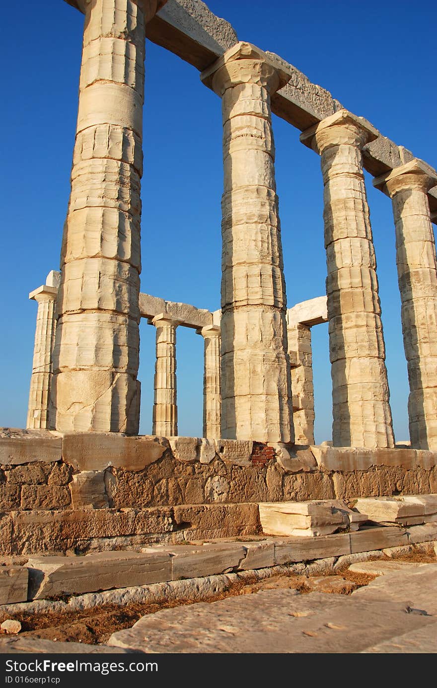 Columns from the  temple of Poseidon at cape Sounio in  Greece. Columns from the  temple of Poseidon at cape Sounio in  Greece