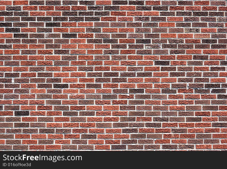 Blind Red and brown brick wall in sunlit.