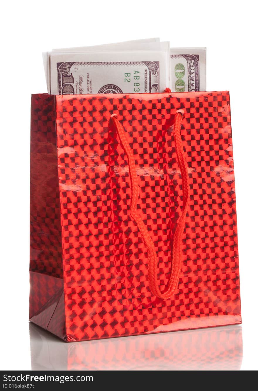 Us dollars in a red gift box, isolated