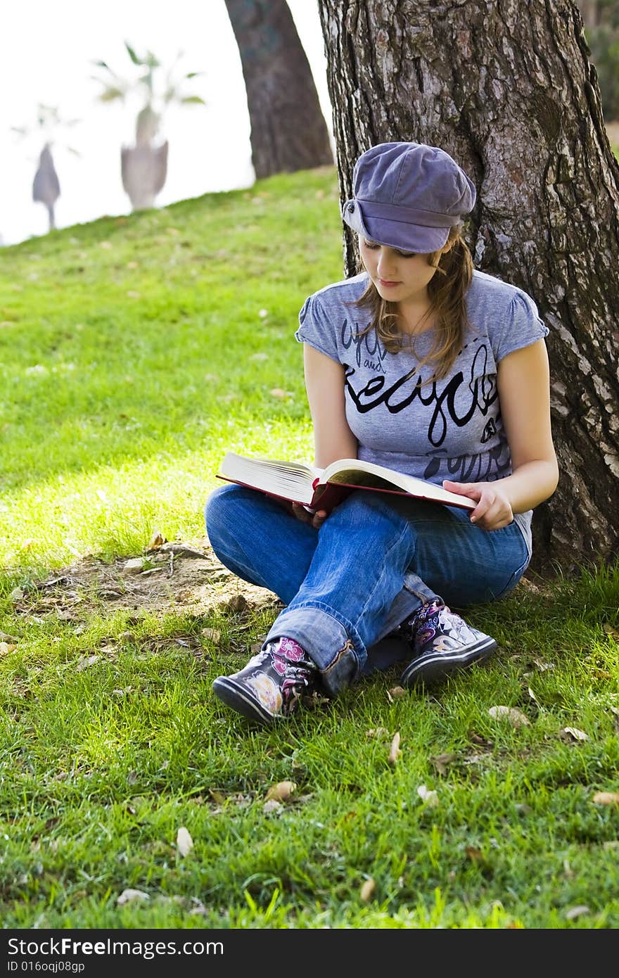 Young woman enjoying a book. Young woman enjoying a book