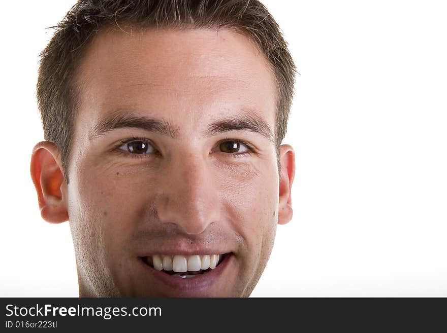 A nice young man smiling in closeup. A nice young man smiling in closeup