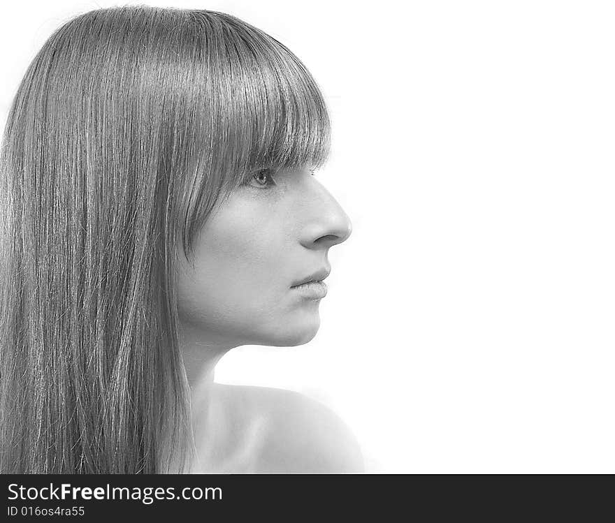 Portrait of the nice young girl with long hair over white. Portrait of the nice young girl with long hair over white