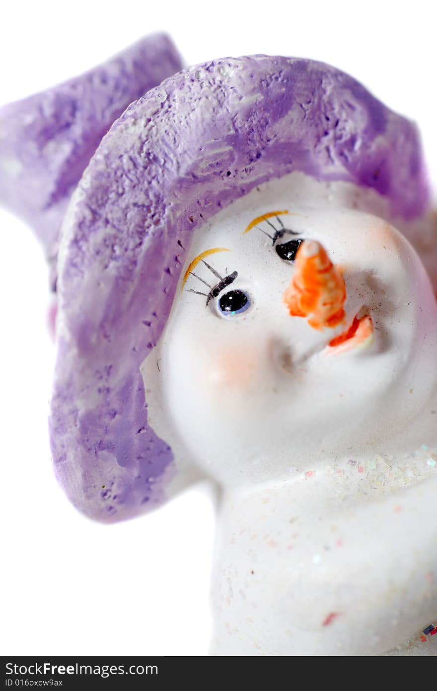 Plastic snow man head close up on white background. Plastic snow man head close up on white background