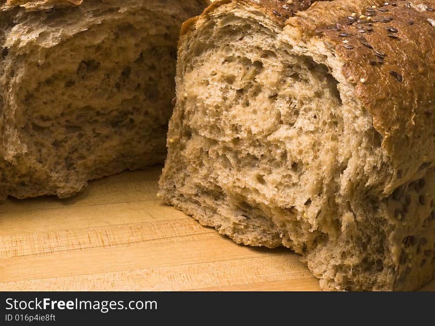 Closeup of a broken loaf of whole wheat bread. Closeup of a broken loaf of whole wheat bread