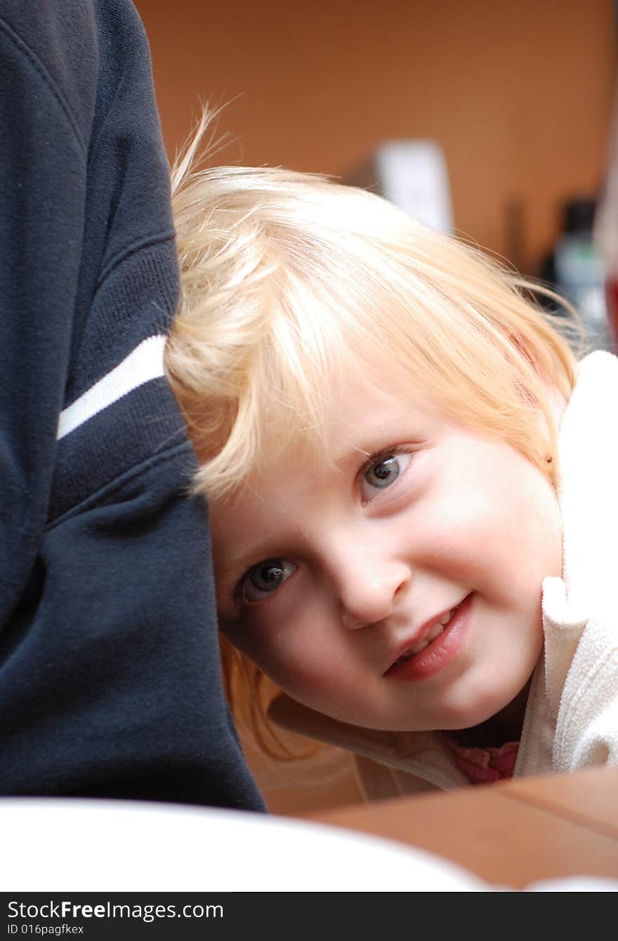 Picture of one little baby girl leaning towards her father. Picture of one little baby girl leaning towards her father