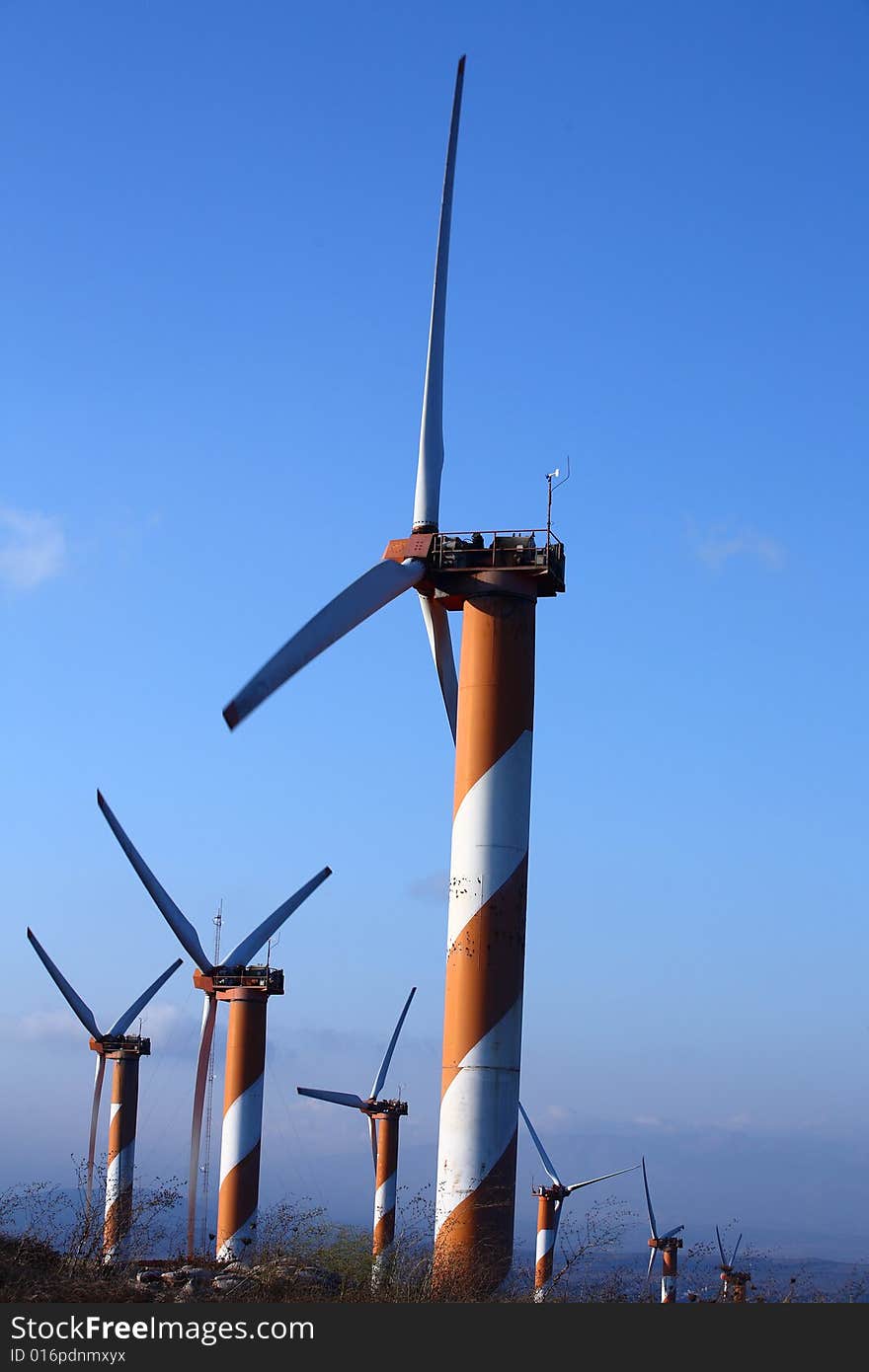 Wind turbine making green electricity. Wind turbine making green electricity