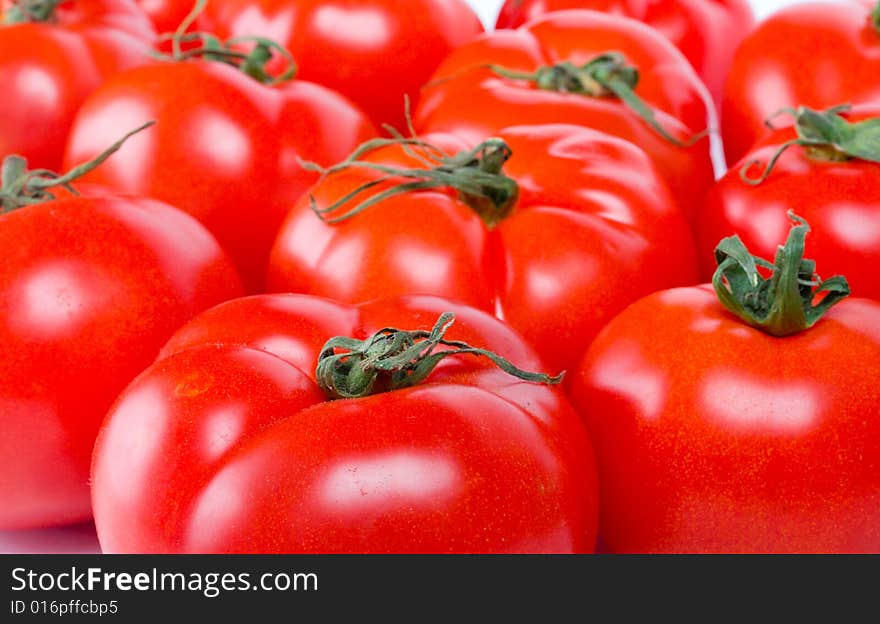 Many red ripe tomatoes