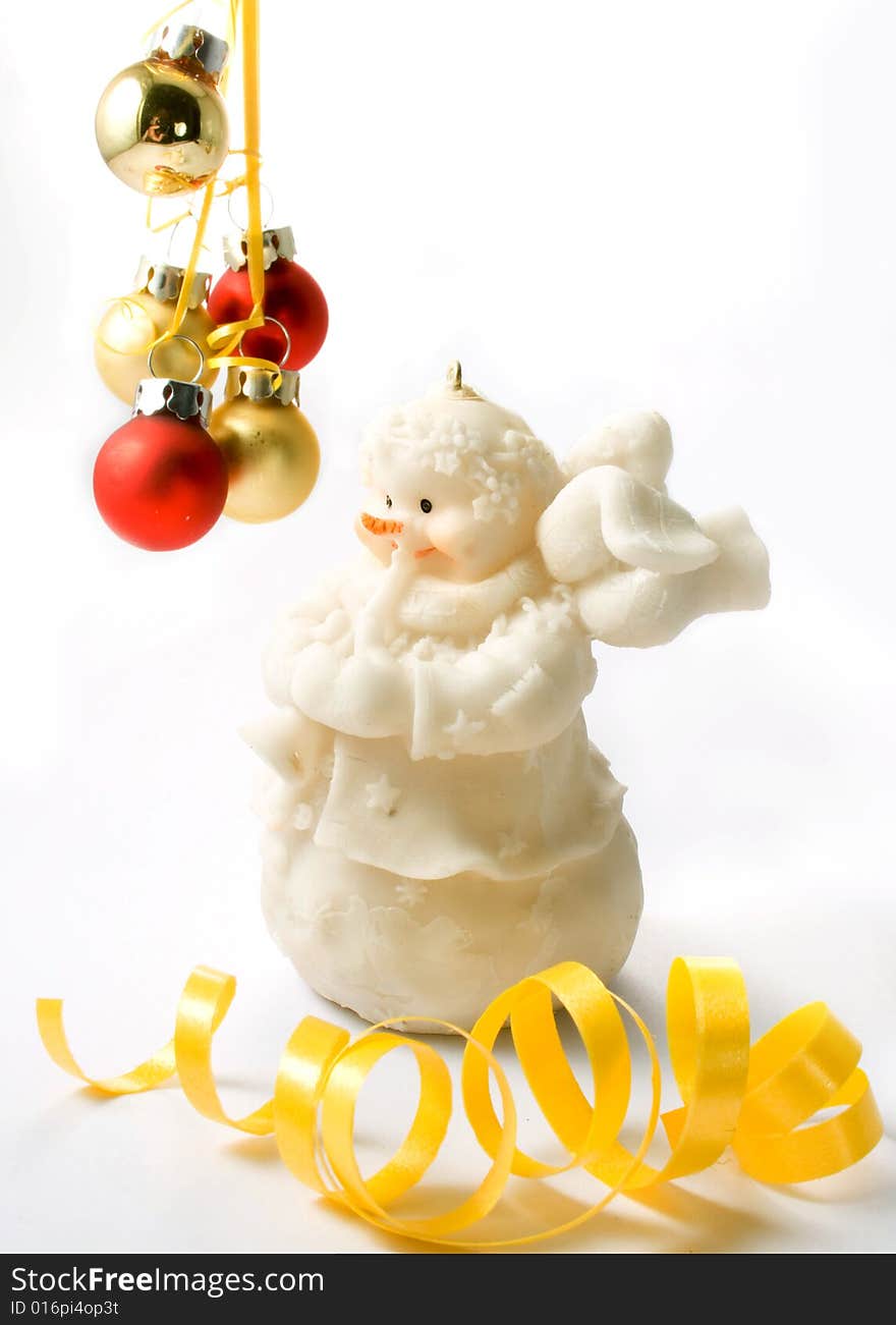 Angels, fur-tree toys, on a white background