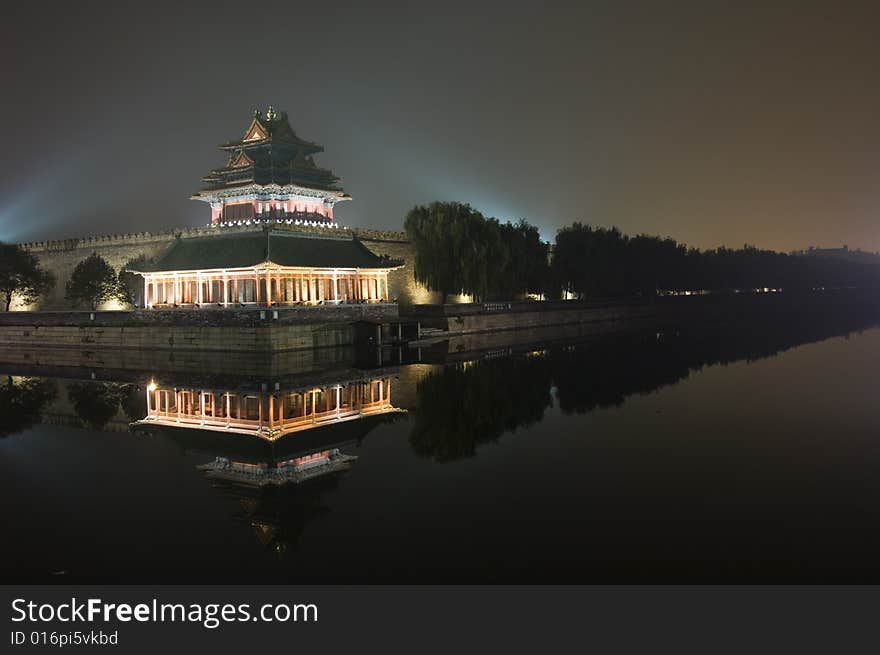 Moat, turret, wall and buildings in forbidden city, Beijing, China. Moat, turret, wall and buildings in forbidden city, Beijing, China