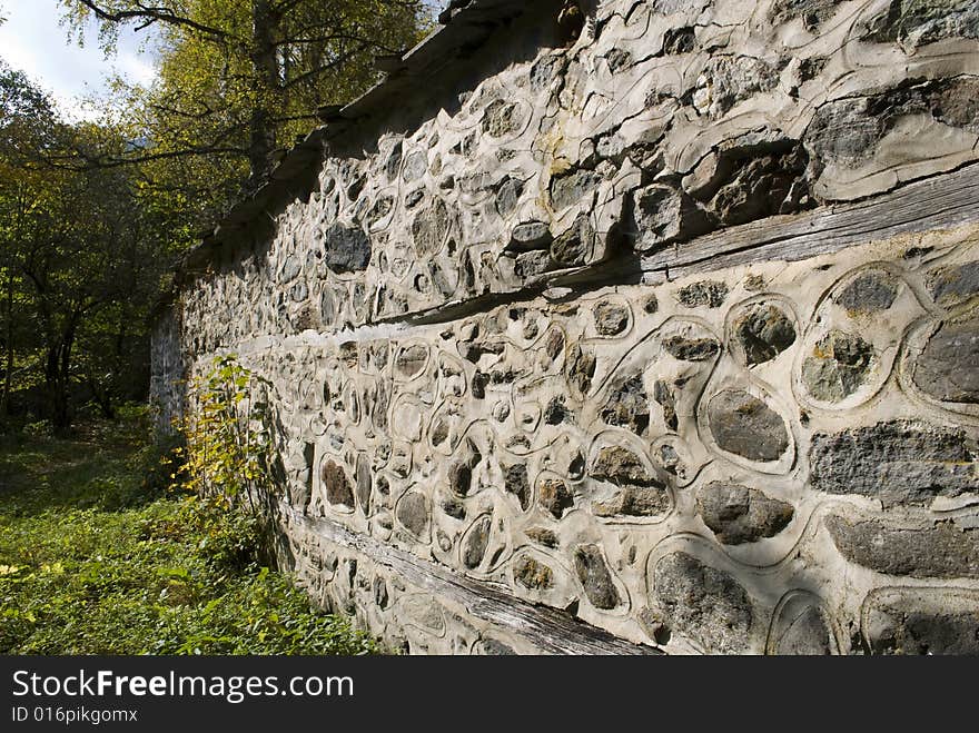 An old masonry wall with built in stones