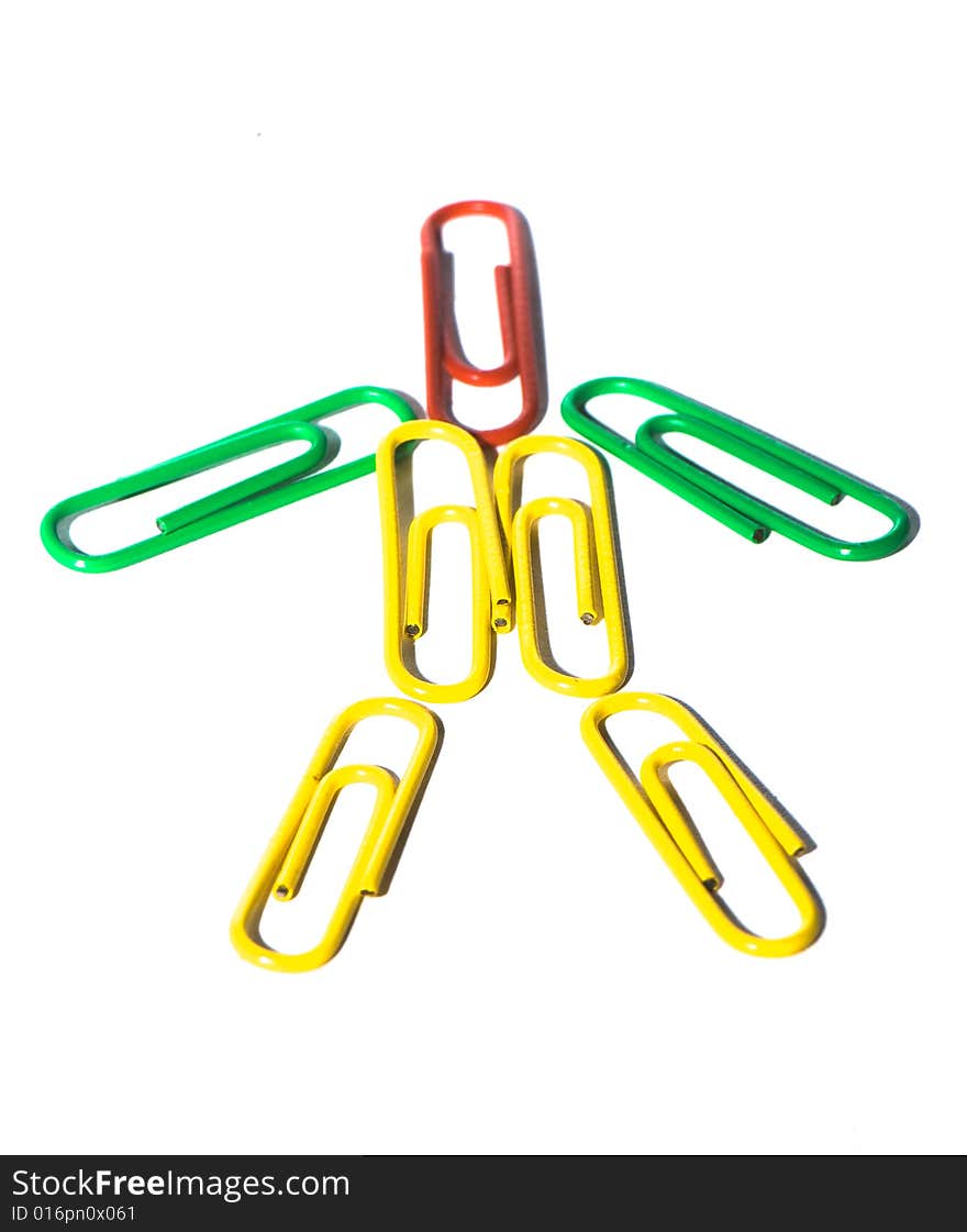 Paper clips in different figures on a white background