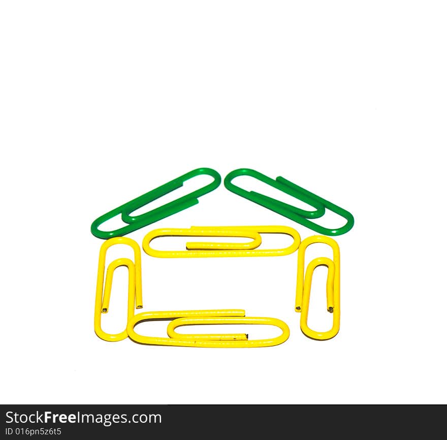 Paper clips in different figures on a white background