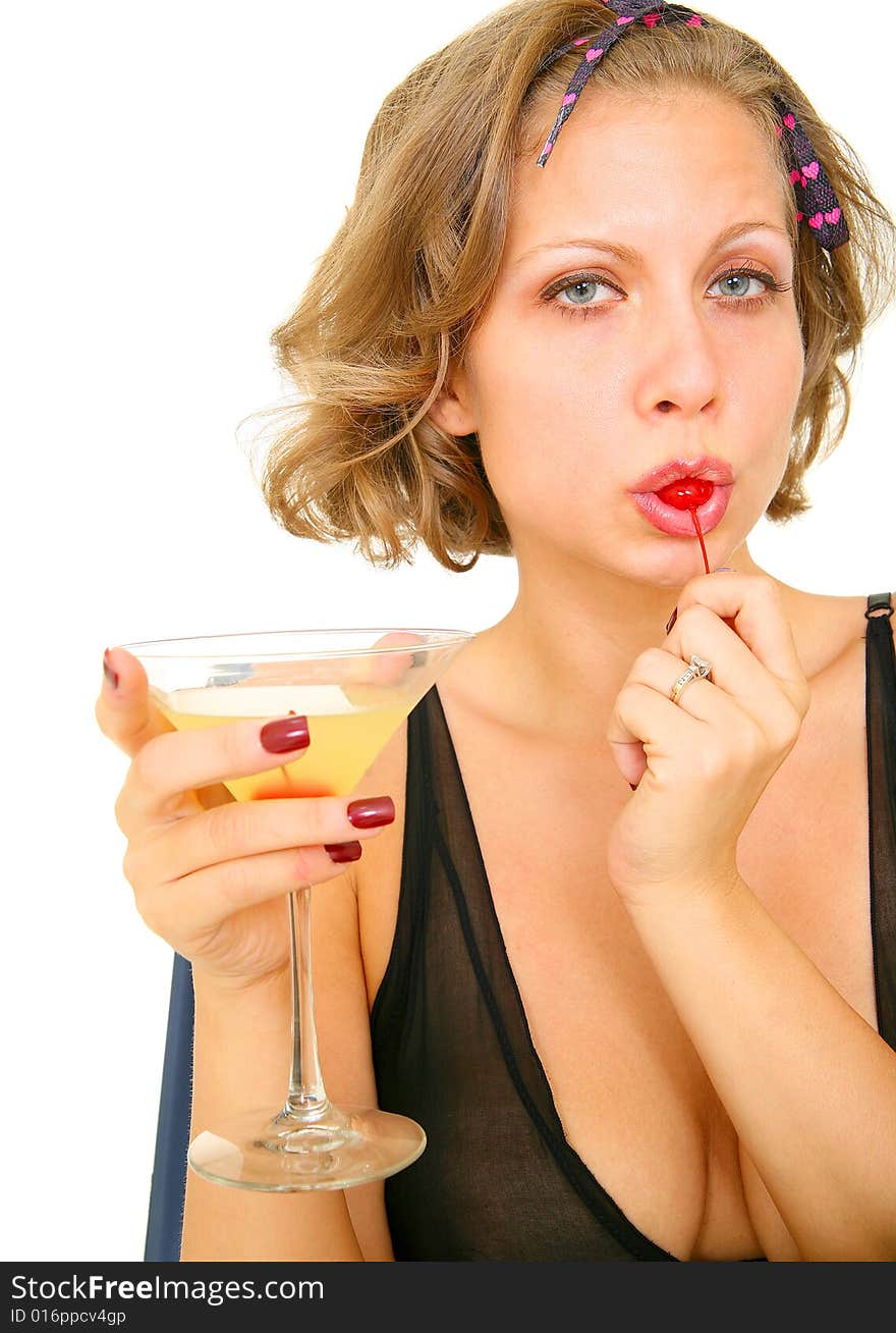 Sexy pin up girl eating cherry and holding margarita