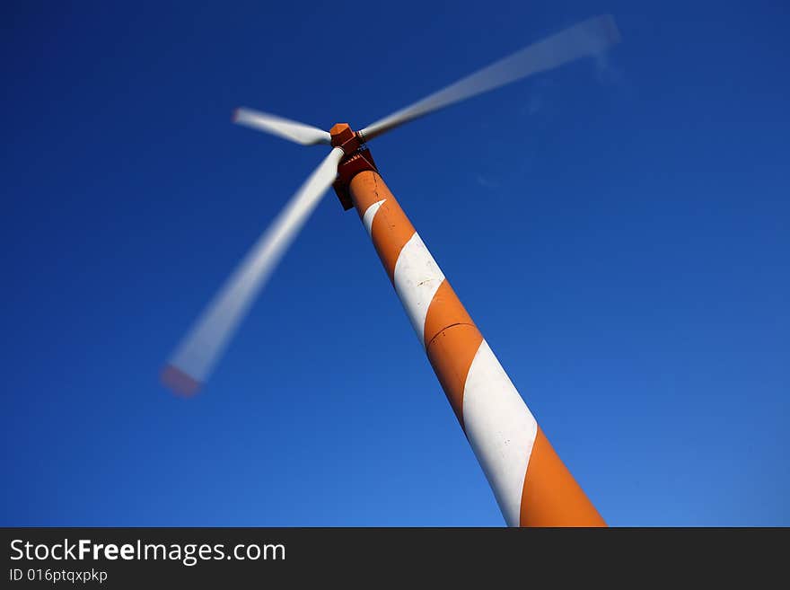 Wind turbine making green electricity. Wind turbine making green electricity