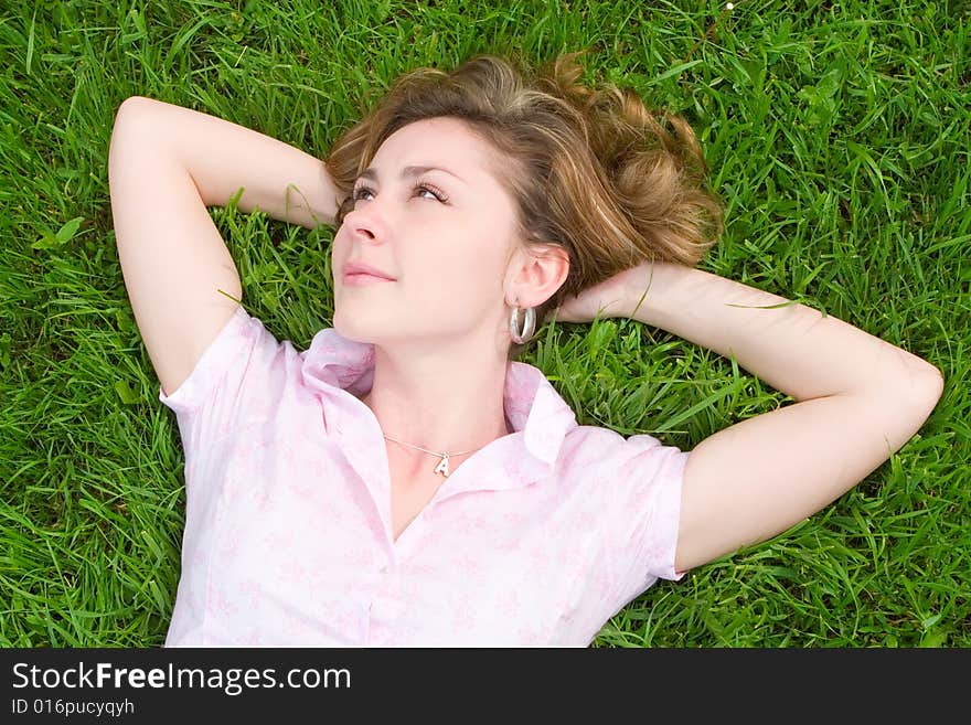 Sweet woman rest on the grass