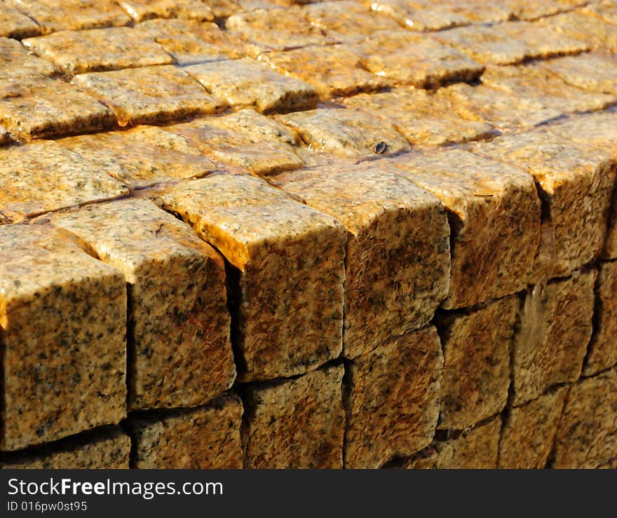 Block wall covered with film of flowing water. Block wall covered with film of flowing water