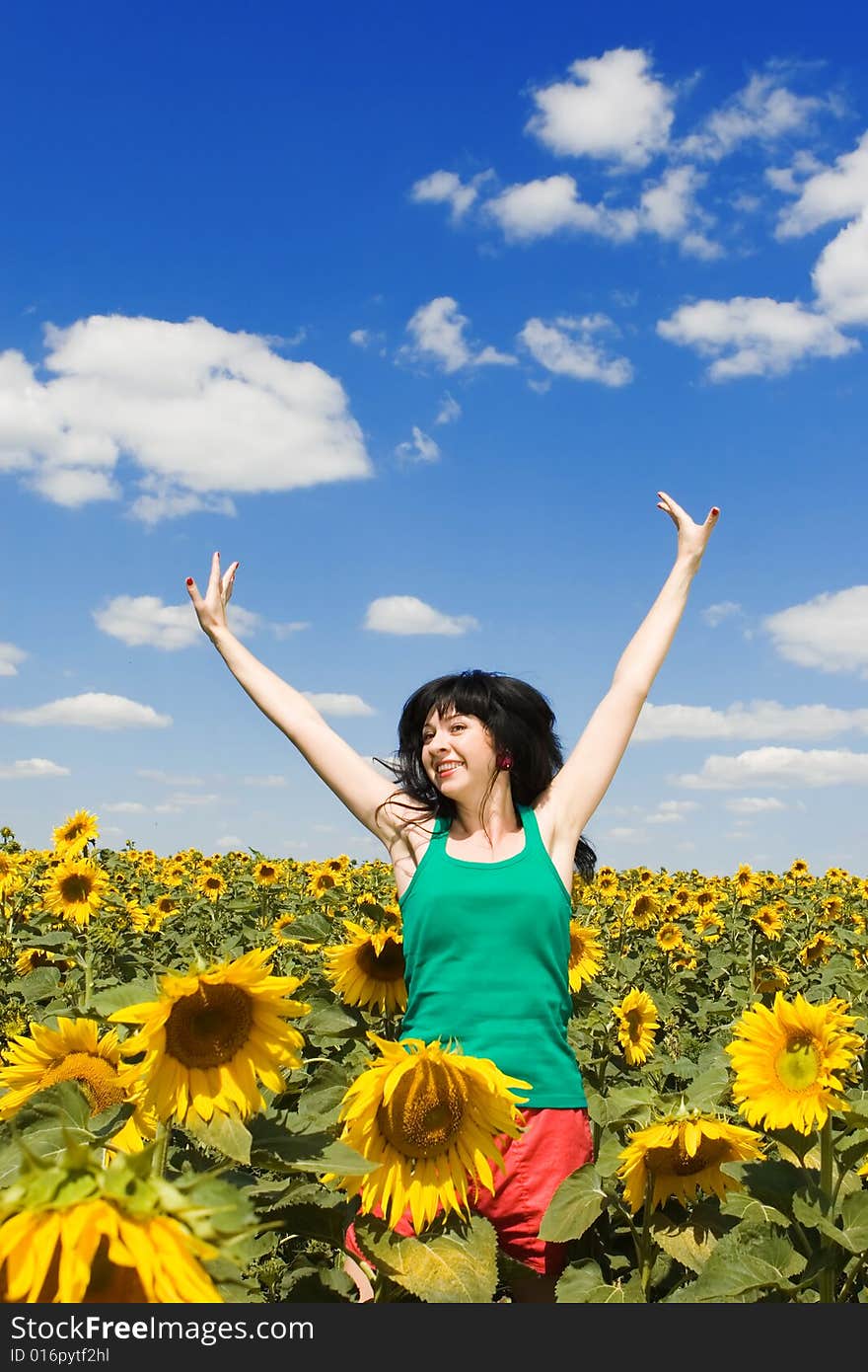 Woman In The Field Of Sunflowers