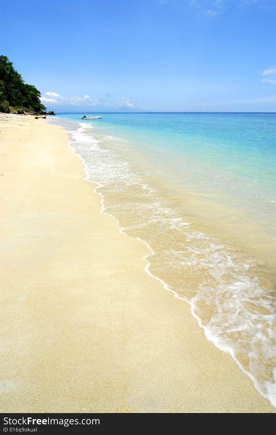 It's a photo of a tropical beach. It's a photo of a tropical beach