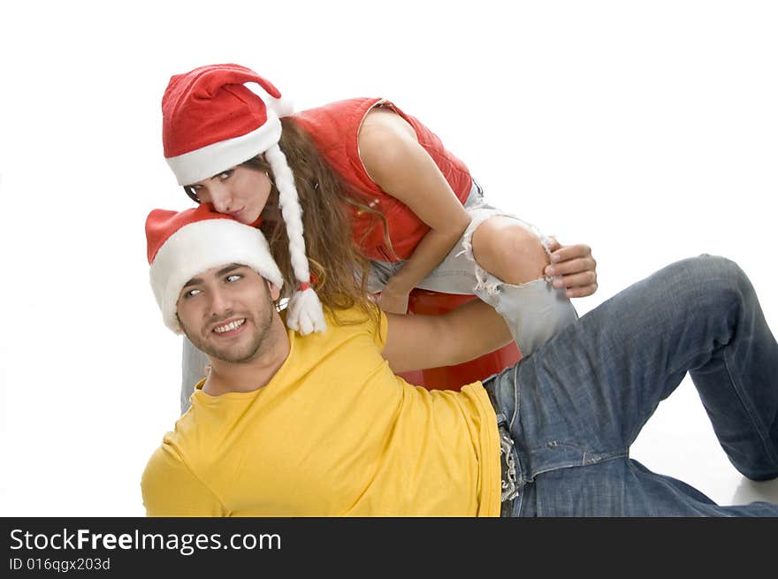 Lady kissing on man's head on an isolated background