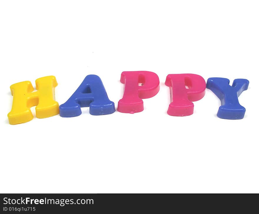 The word happy spelled out in 3d