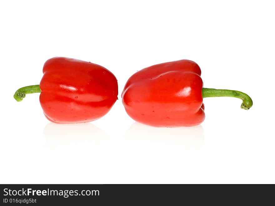 Two red sweet peppers