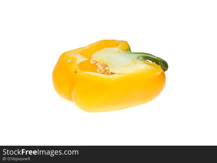 Half of yellow sweet pepper isolated on the white background