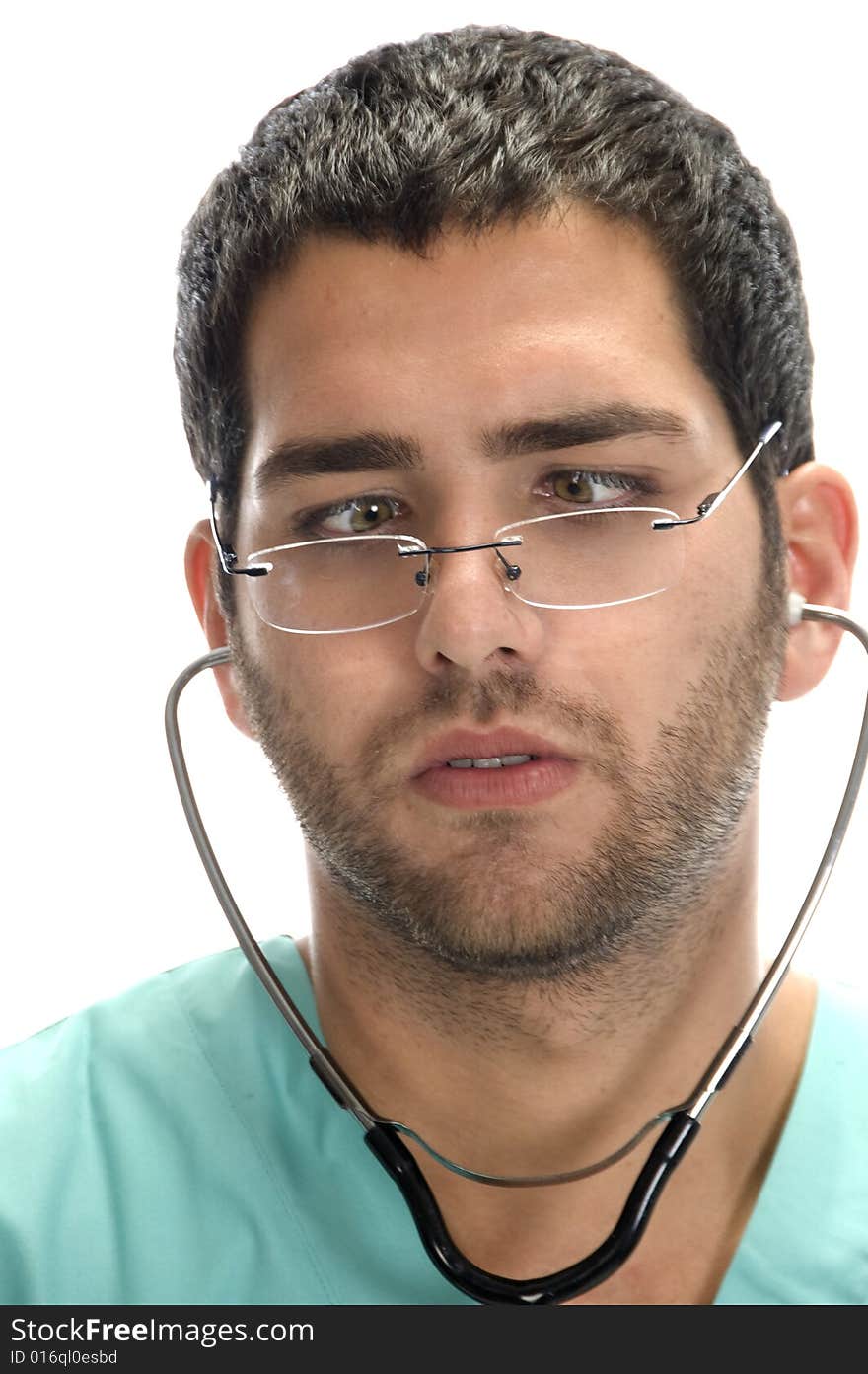 Doctor with stethoscope in his ears looking squint