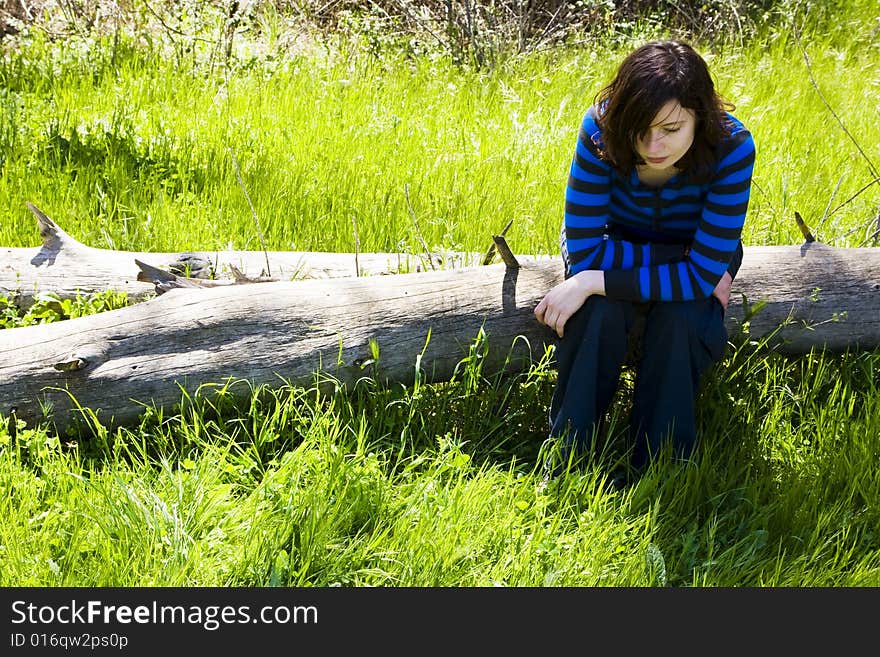 Young woman on trunk