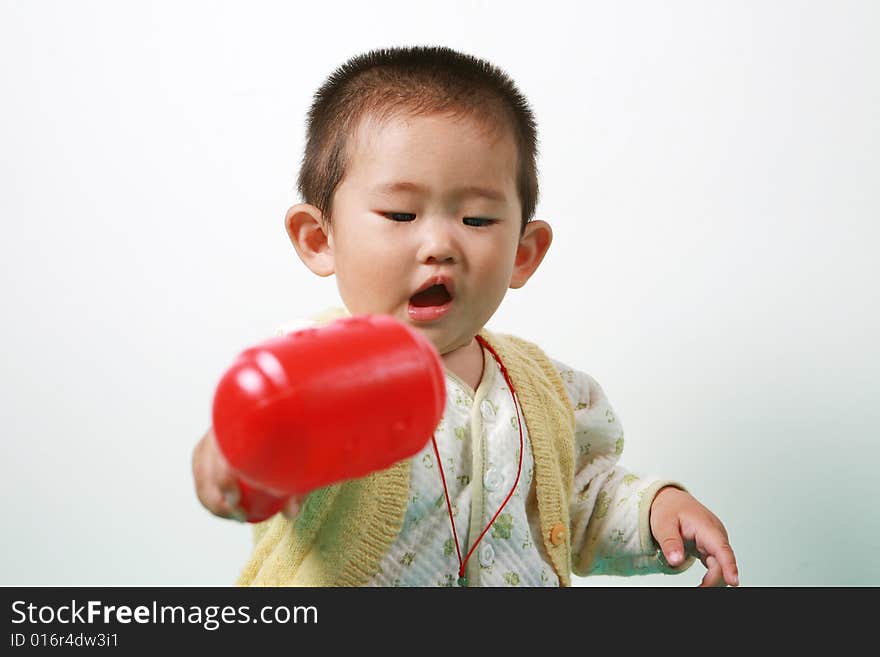 Young chinese boy play with toy. Young chinese boy play with toy