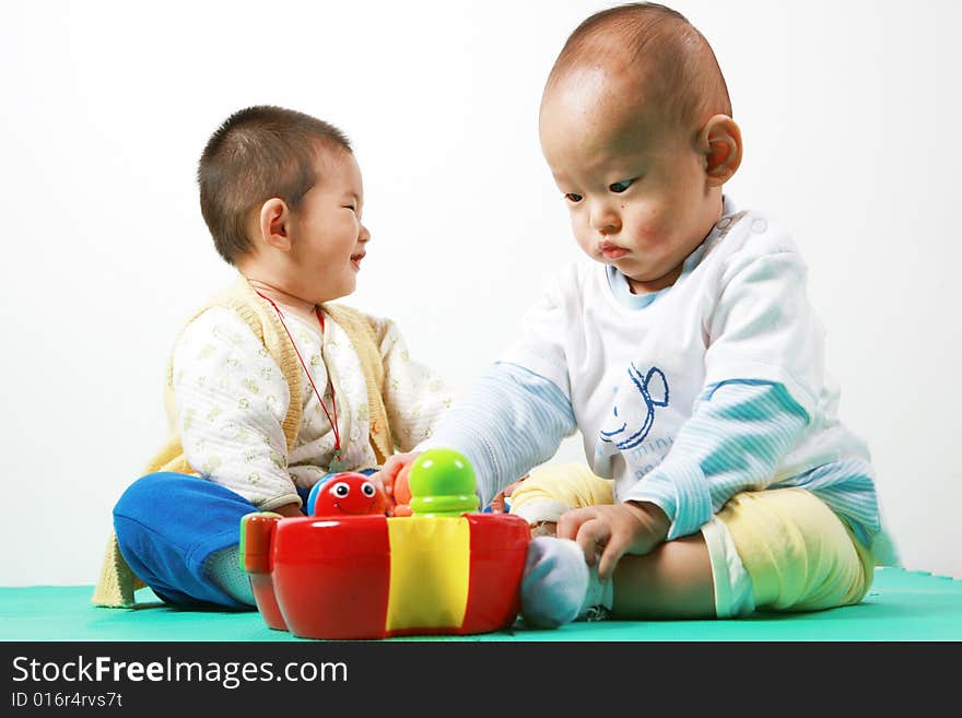 Young chinese boy play with toy. Young chinese boy play with toy