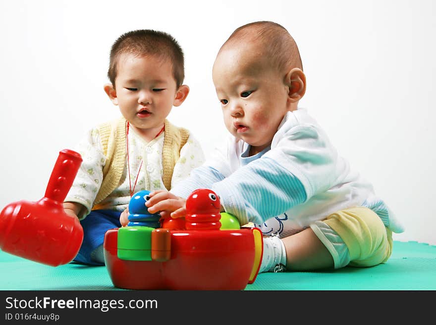 Young chinese boy play with toy. Young chinese boy play with toy