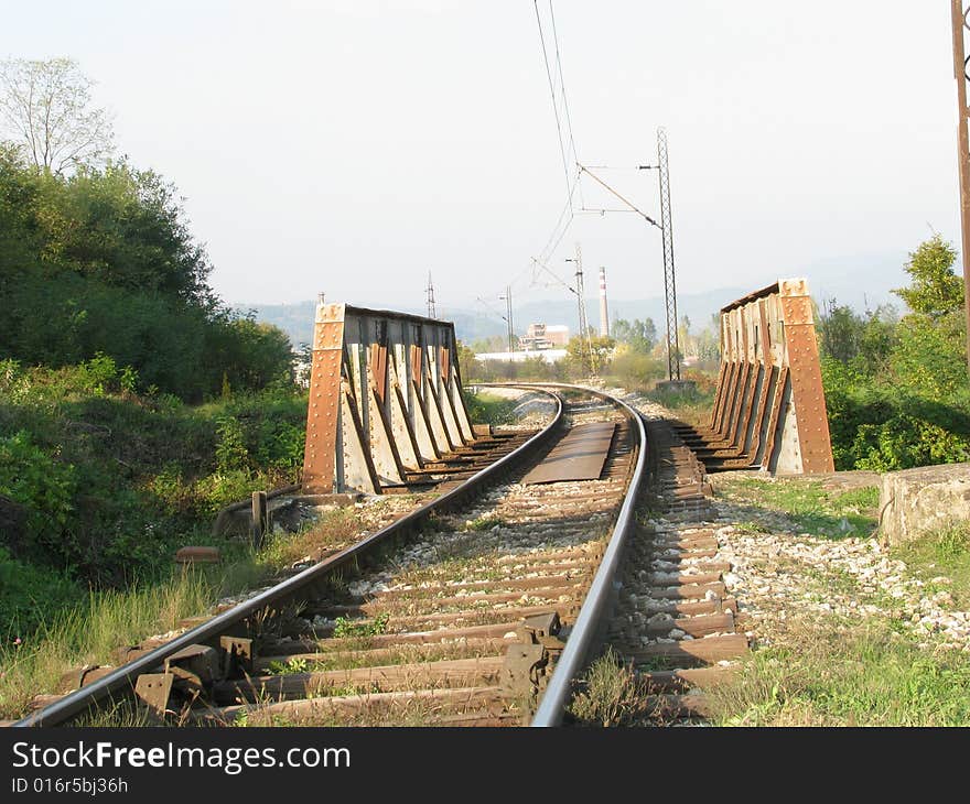 An image of a rail track in motion